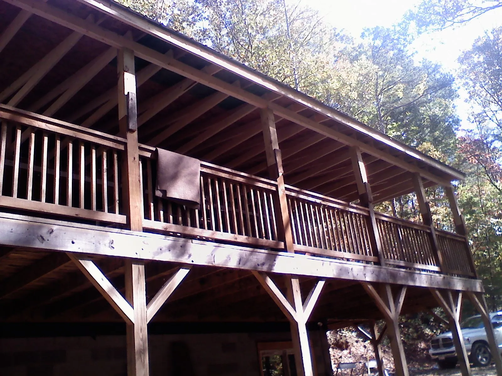 Timber framing under a new elevated porch and deck — Roof Leak Repair in New Paltz by Roofing Brothers